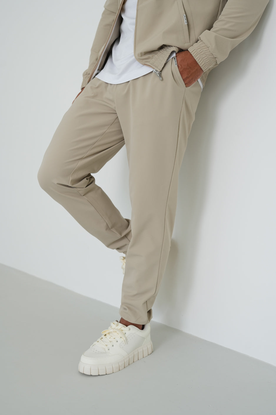 The milano suit taupe