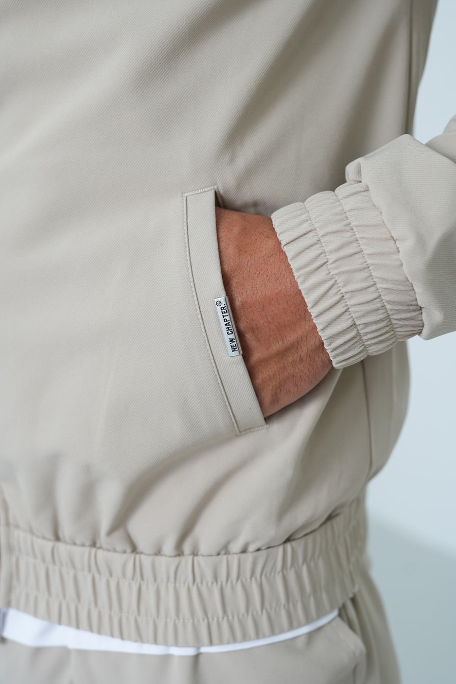 The milano suit taupe