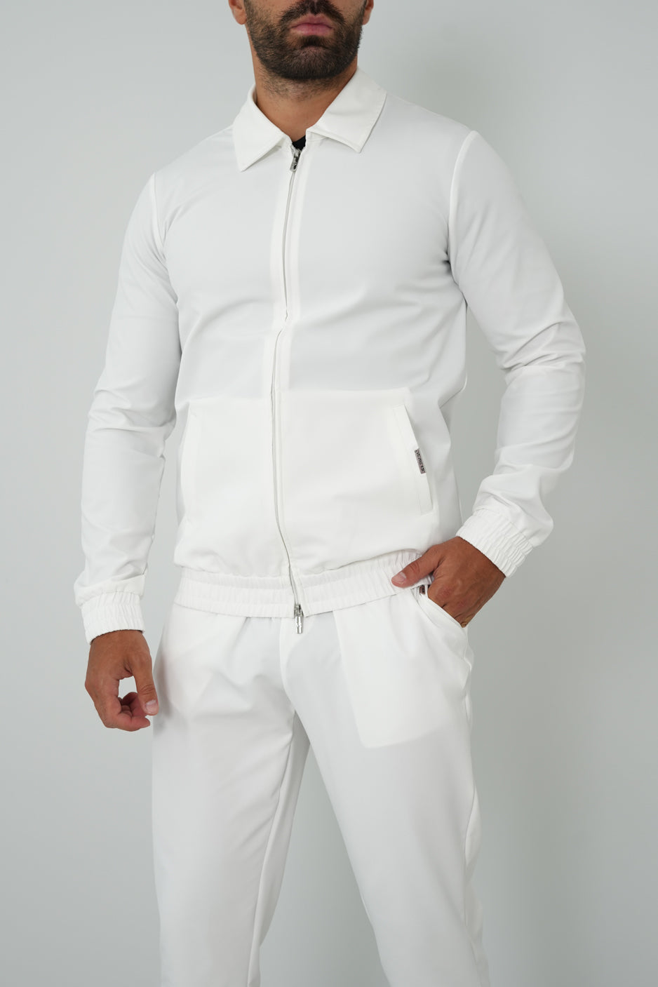 TRACKSUIT GEBROKEN WIT