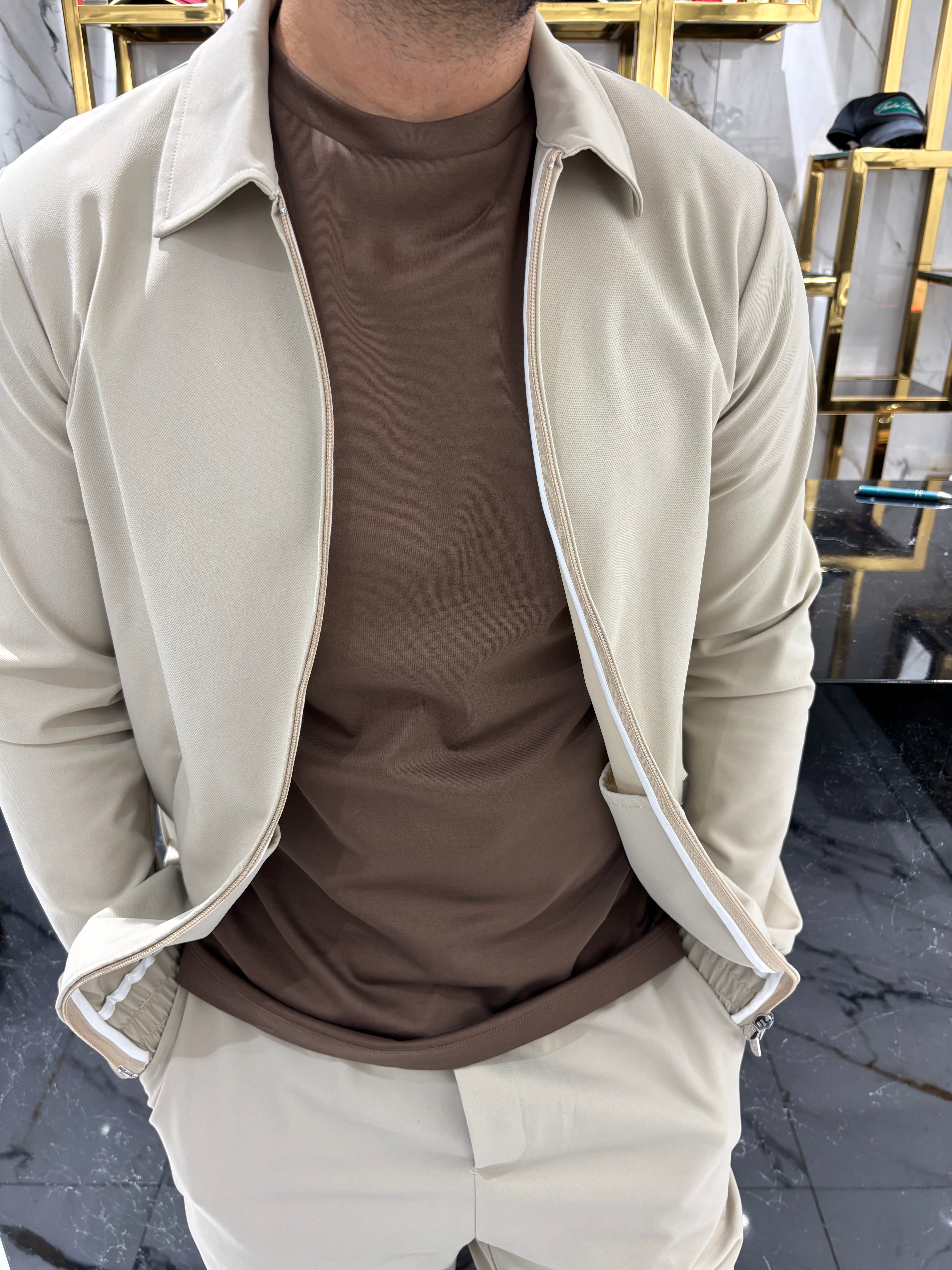 The milano suit taupe